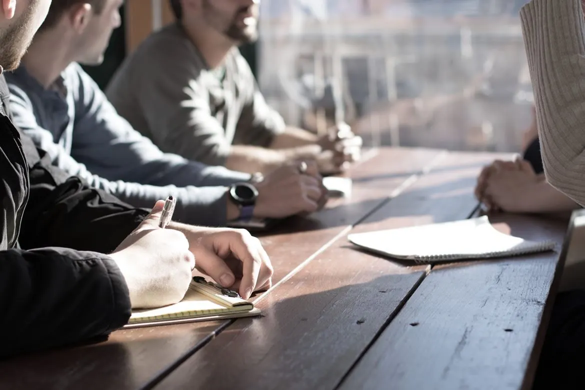 Corporate team collaborating in a professional office environment